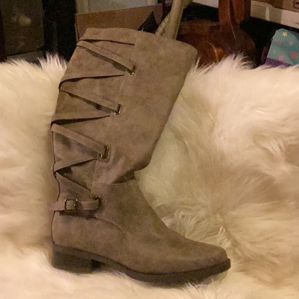 Knee high gray side zip boots.  Never worn.